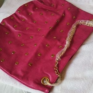 New, hot pink handbag.